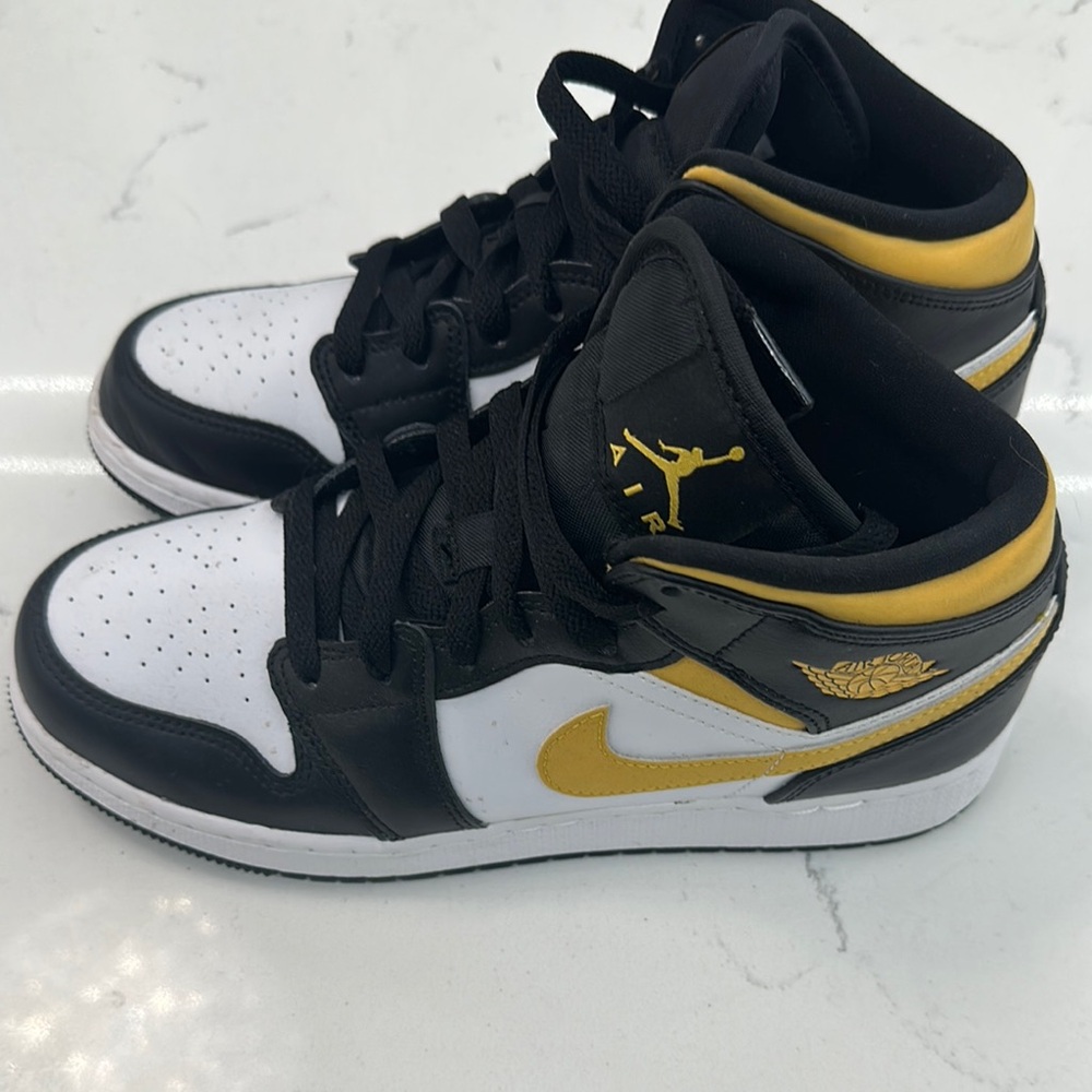 Nike Black and Gold Sneakers